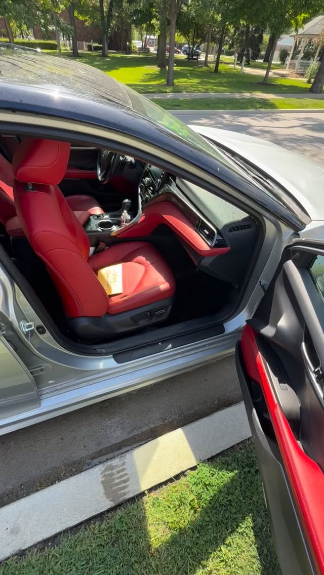 Camry with red leather interior, detailed, door open